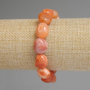 Carnelian bracelet, faceted on stretch base, diameter 11-14x11-12mm ±, length 18mm ±