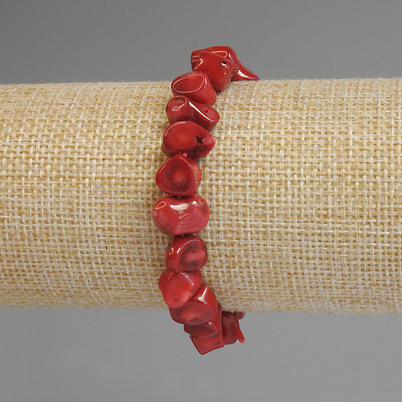 Faceted coral bracelet, 6-9×4-7 mm, length 18 mm, stretch base