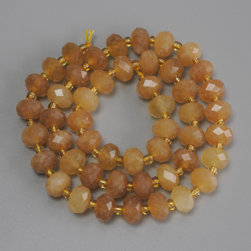 Citrine beads, faceted rondelle, diameter 8x5 mm, 5 mm ±; seed beads 3 mm ±, length 37 cm ± on thread