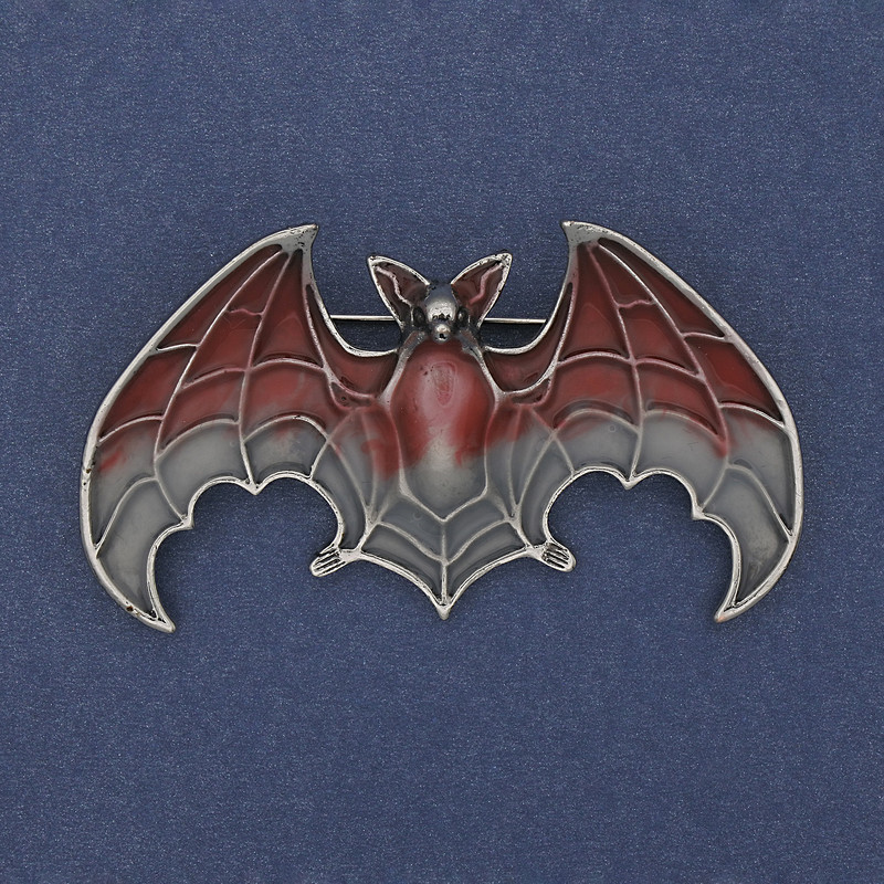 Bat pendant-brooch with red and gray enamel on silver-toned metal 36x60 mm +