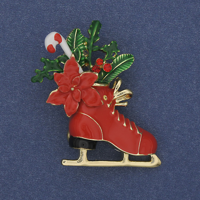 Brooch 'New Year's Skate' red and green enamel on gold-tone metal 27×38 mm +