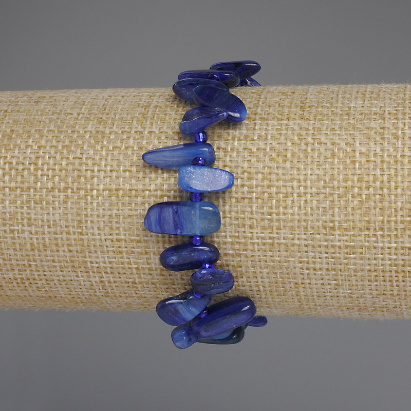 Kianite Bracelet, Faceted - Butterfly, diameter 11-16 x 6-8 mm, +/- 3 mm beads, length 18 mm +/- stretch