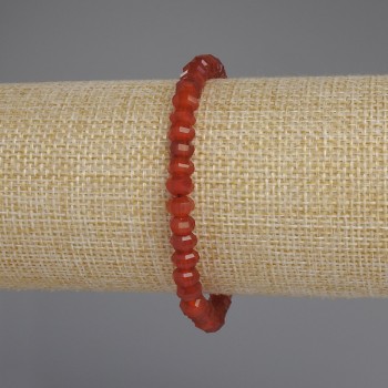 Bracelet with faceted carnelian rondel, 6x4 mm diameter, 18 mm length, stretch