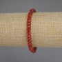 Bracelet with faceted carnelian rondel, 6x4 mm diameter, 18 mm length, stretch