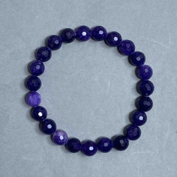 Sugilite bracelet with a faceted bead, 8 mm diameter, 18 mm length, stretch