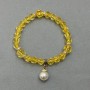 Citrine bracelet with faceted beads, 7 mm diameter, with a 10 mm pearl, length 18 cm ± stretch