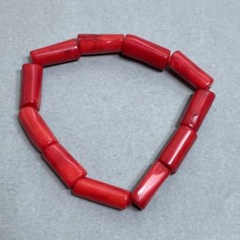 Bracelet with faceted coral 18-22×9-12 mm +-, length 18 mm +/- stretch