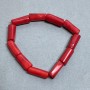 Bracelet with faceted coral 18-22×9-12 mm +-, length 18 mm +/- stretch