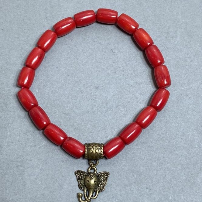 Bracelet Coral Barrel 9.5×6.5 mm with inlay, length 18 mm +- elastic