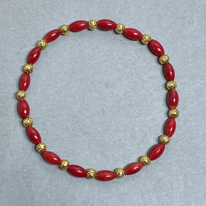 Coral Grain Bracelet 8x4mm +/- with Metal Inserts, Length 18mm +/- Stretch