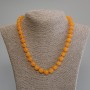 Cat's Eye Necklace in Orange with Smooth Beads, 9.5 mm Diameter, 45 cm Length + 5 cm Extender Chain