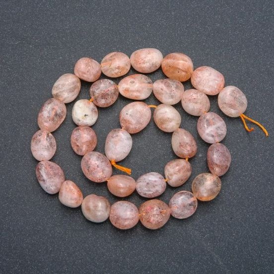 Beads on a string of natural selenite, faceted, diameter 12×10 mm, length 40 cm +