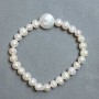 Bracelet of Freshwater Pearls 7-8x6-7, 5mm+-, Baroque Pearl 15mm+-, Length 18mm+-, Stretch