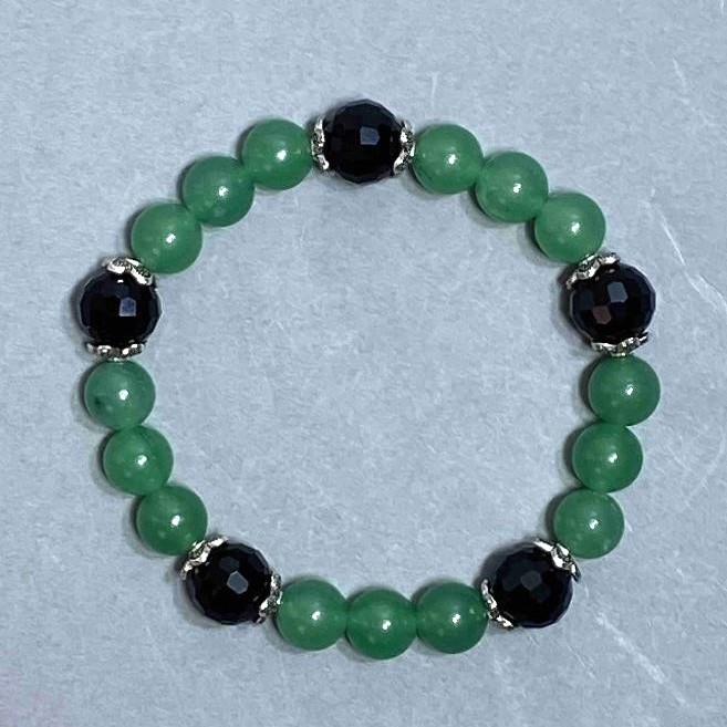 Bracelet with nephrite beads, 8 mm diameter ±, Czech crystal faceted bead 10 mm ±, length 18 cm stretch