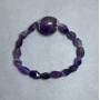 Amethyst bracelet, faceted 19×16 mm, with bicones 9-11×7-8 mm, 18 cm stretch