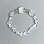 Bracelet with rock crystal, 11×10 mm ± 16×12 mm ± 19×14 mm ±, with metal inserts, length 18 cm stretch