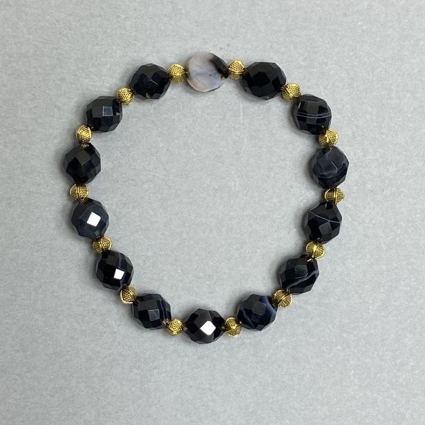 Agate bracelet with faceted beads 10×8 mm, with metal inserts, 18 cm stretch
