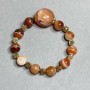 Agate Bead Bracelet with 10mm beads and a 20mm faceted insert, with metal accents, 18 cm stretch