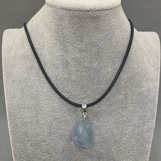 Unpolished Aquamarine Pendant, assorted diameter 31×16–37–18 mm +/- on cord, cord diameter 2.5 mm +/-, length 50 cm +/- chain