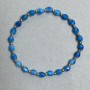 Apatite bracelet with faceted beads, 6×4 mm; hematite beads 2 mm; length about 18 cm; stretch