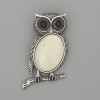 Owl Brooch Pendant with Mother-of-Pearl, 45x25mm +/- black rhinestones, silvery metal