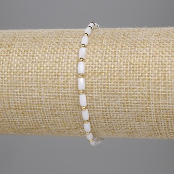 Bracelet with white Czech crystal, faceted cylindrical beads 5x3 mm, 2 mm beads, 18 cm length, stretch