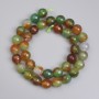 Beads of Brazilian Agate, faceted round beads, approximately 10mm diameter, approximately 36 cm length on thread