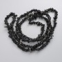 Beads of silvery obsidian, natural stone chips on thread, diameter 5-8 mm, 5x2-4 mm +/-, length 78 cm