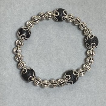 Bracelet with smooth lava beads, 10 mm diameter ±, with metal inserts, length 18 cm ±, stretch