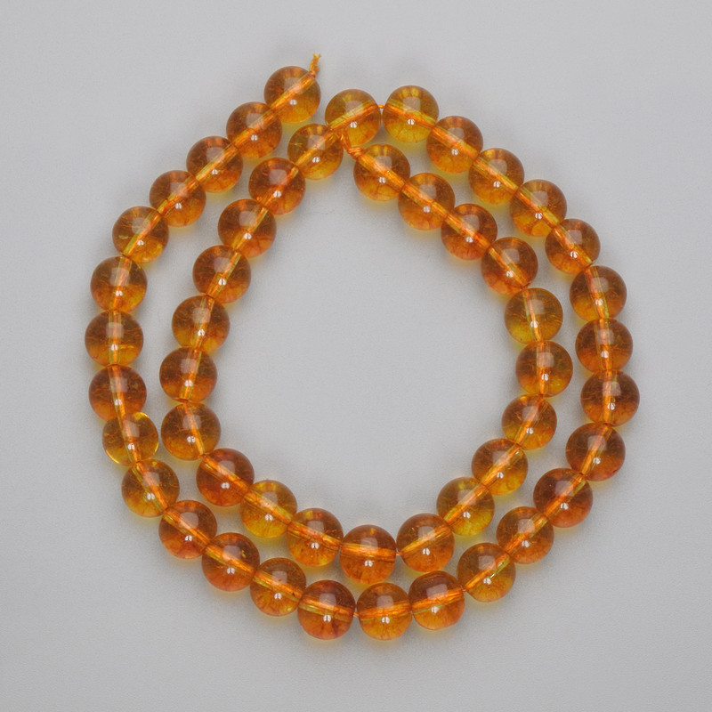 Citrine beads pressed smooth spheres, 8mm diameter, on thread, length 38 cm