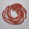 Sponge Coral Faceted Beads, 7-12×9-10 mm, +/- (assorted sizes), on beading thread, length 42 cm+