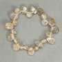 Bracelet of Rutilated Quartz 'Hair Quartz' Faceted Butterfly Beads 10-15×9-11 mm, length 18 cm, stretch