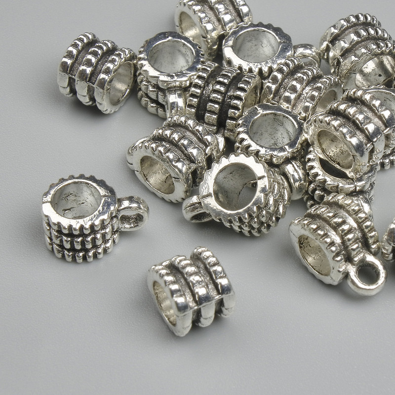 Bail findings, silver-colored, dimensions 6.5×9.5 mm, hole diameters 2.2 mm and 4.6 mm, pack of 18