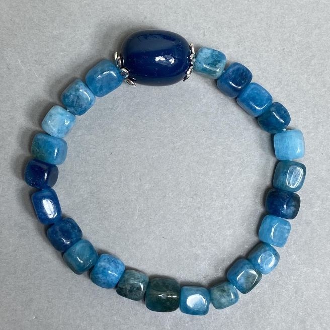 Apatite cube bracelet 6–7 mm with faceted elements 19×14 mm, with metal inserts, 18 cm stretch