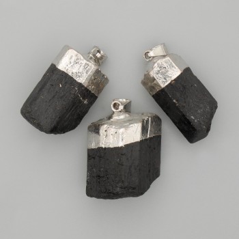 Pendant with unpolished tourmaline stone, diameter approximately 28x18 mm, length 45 mm+