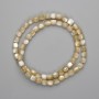 Beige mother-of-pearl barrel beads, 6x6 mm, 39 cm long on thread