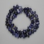 Sodalite beads, faceted, 8–16×5–7 mm, 5 mm ±, on a thread
