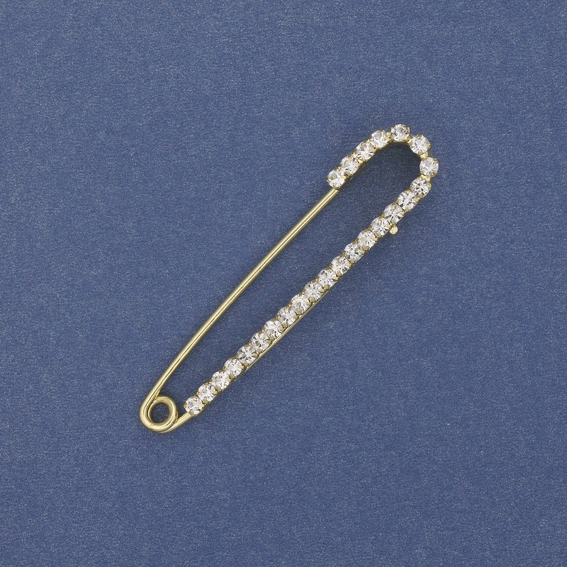 Brooch pin with white crystals, 56×11 mm (approx.), gold-tone metal
