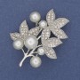 Brooch 'Twig' with white pearls and clear crystals, silver-toned metal, 50×35 mm+