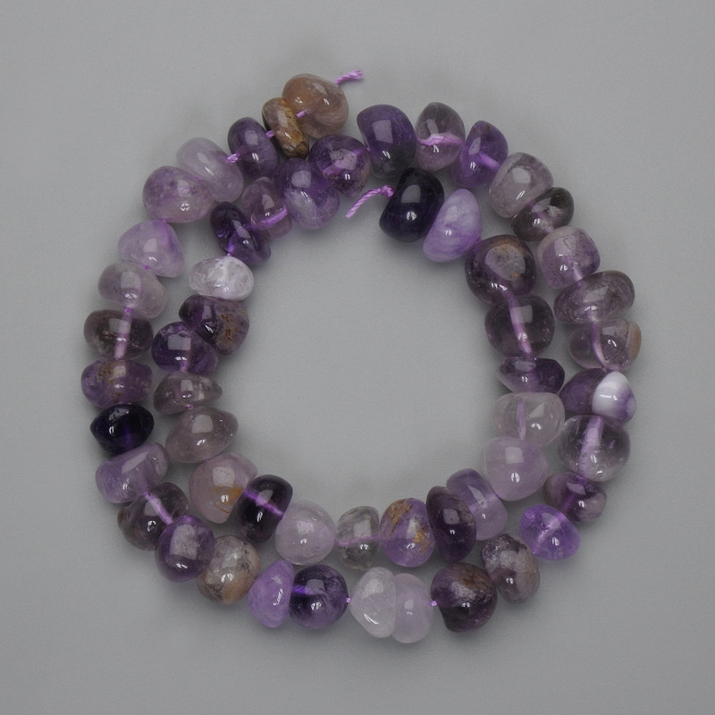Faceted Amethyst Beads, 9–10×5–9 mm, 39 cm strand