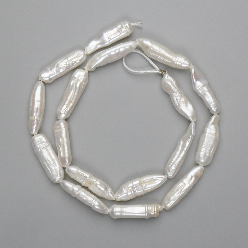 Baroque pearls with a gasoline shade on a strand 20-26×6, 5-7, 5 mm +-, length 40 cm+