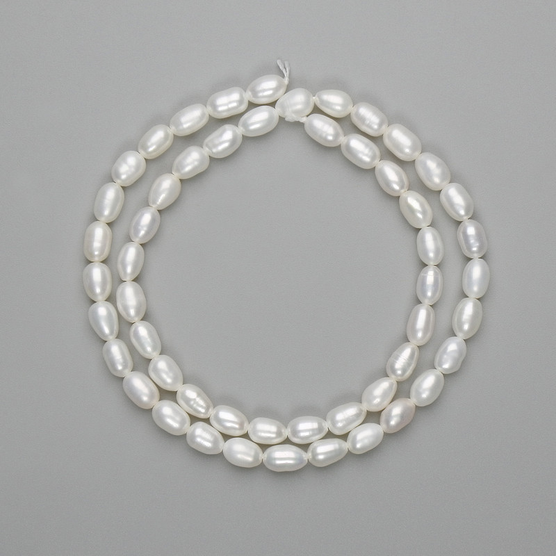 Natural freshwater pearl beads 6–6.5×4.5 mm, length about 35 cm, on thread