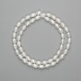 Natural freshwater pearl beads 6–6.5×4.5 mm, length about 35 cm, on thread