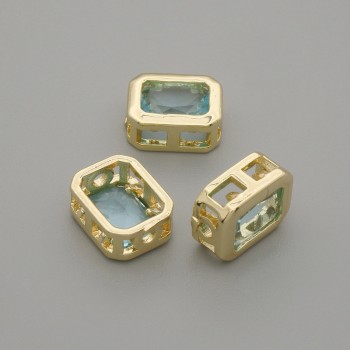 Bead insert with blue crystal, gold-tone metal, 9x7 mm diameter ±, hole diameter 1.3 mm ±, per 1 piece