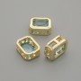 Bead insert with blue crystal, gold-tone metal, 9x7 mm diameter ±, hole diameter 1.3 mm ±, per 1 piece