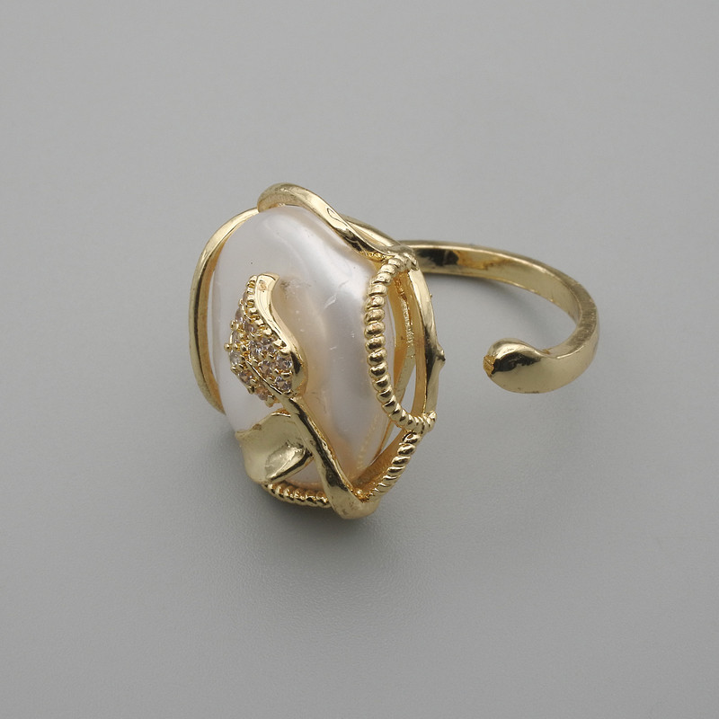 Baroque Pearl Ring in a Golden Setting ~, diameter 22x20 mm ± b/r