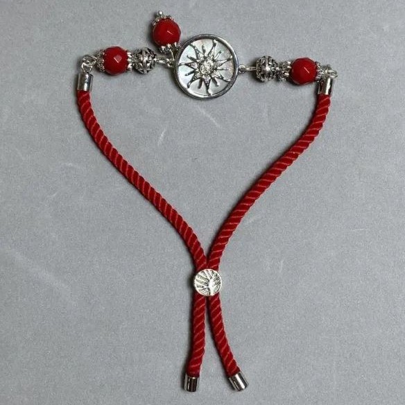 Textile Bracelet, cord diameter 5.5 mm +/-; adjustable slip closure; Coral faceted bead 8 mm +/- with silver metal insert, diameter 17 mm +/-