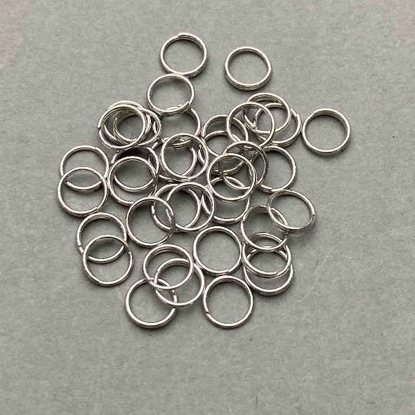 Spring-loaded jump ring, 7 mm diameter, silver-colored metal, packaging 0.5 kg