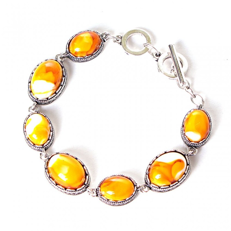 Discounted Amber Bracelet (synthetic) with a «tooth» setting, seven oval stones, 20×16 mm and 13×16 mm, length 18-21 cm