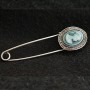 (20/75 mm) Vintage brooch-pin in light metal 'cameo' with small crystals on the bezel